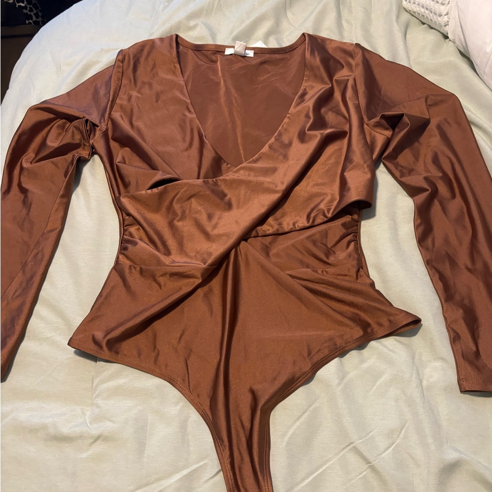 Large v neck wrap snap closure body suit
